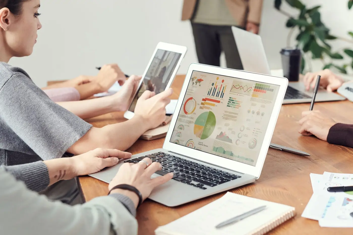 Team reviewing marketing results on a laptop